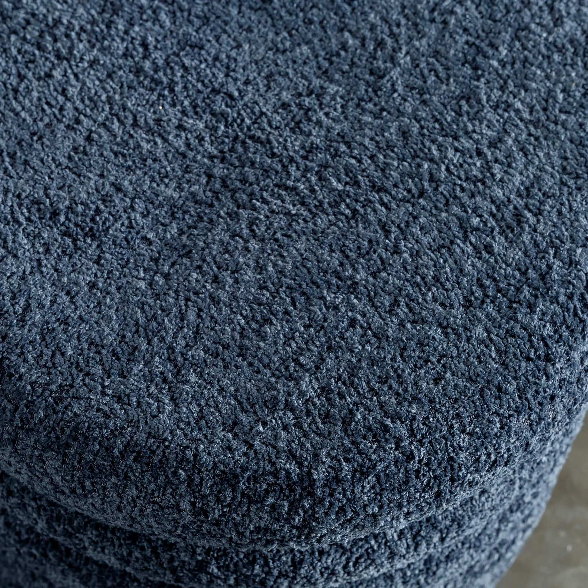 SEVILLA RIBBED STORAGE OTTOMAN  |  REEF NAVY BOUCLE