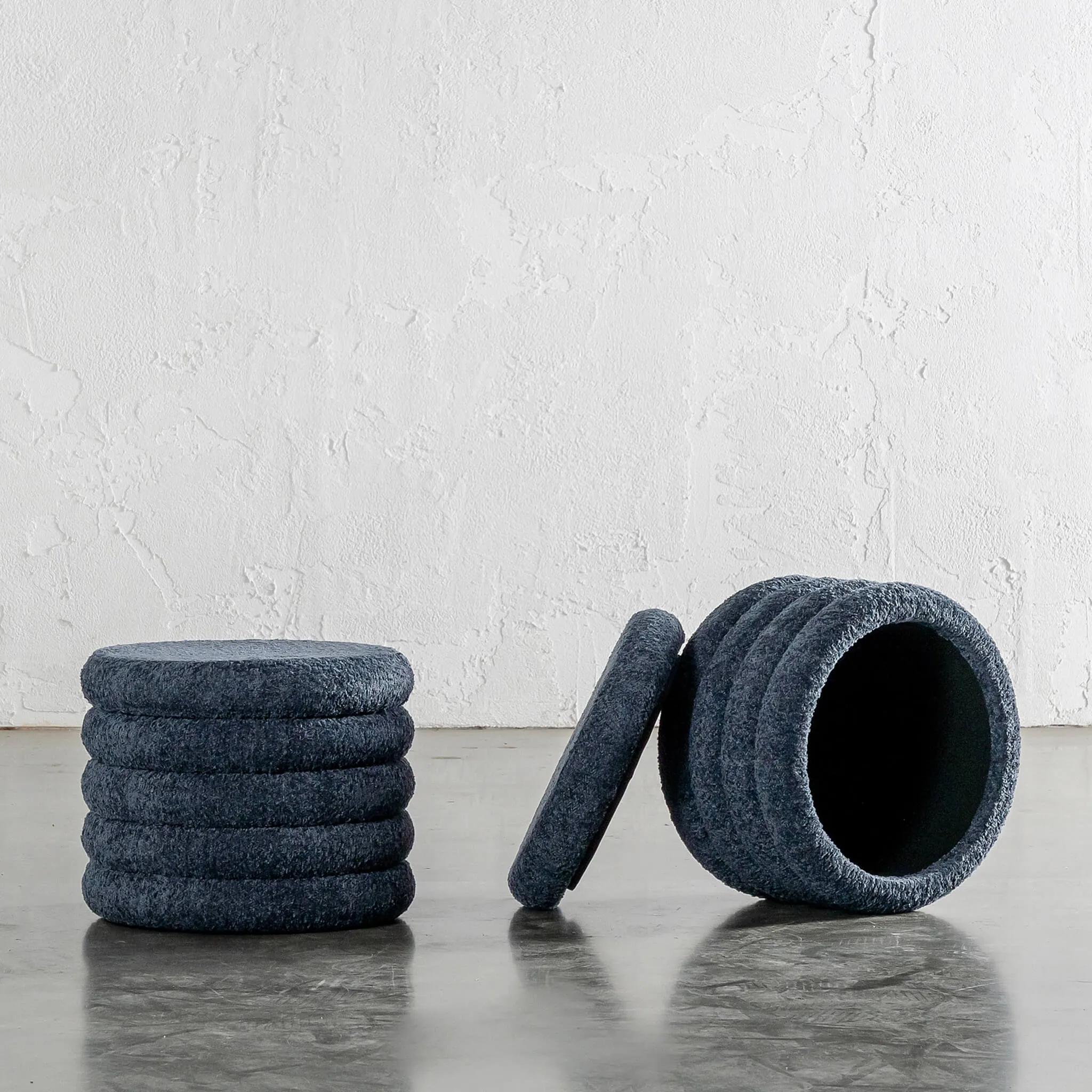 SEVILLA RIBBED STORAGE OTTOMAN  |  REEF NAVY BOUCLE